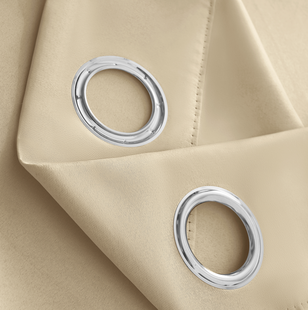 Brown blackout curtain with silver grommets