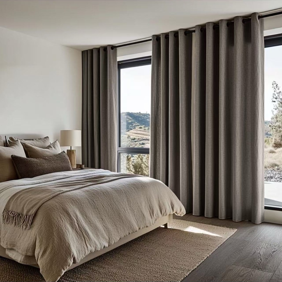 Bedroom with full-length grey curtains