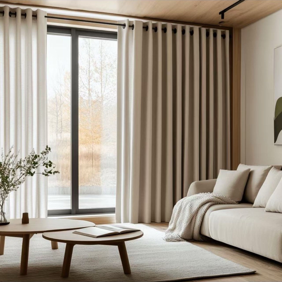 Living room with layered neutral curtains